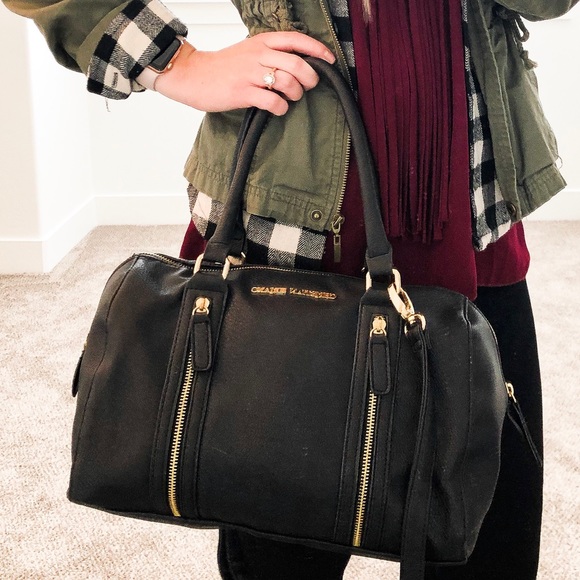 Christian Siriano Handbags - Black barrel purse with gold details